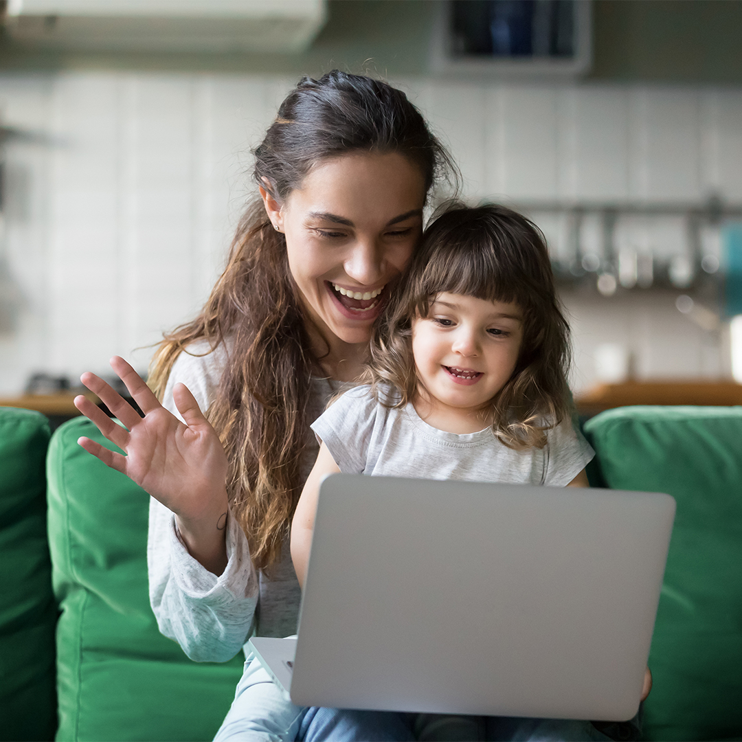 mom-younger-sibling-laptop-waving-hello