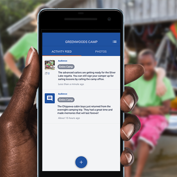 A mobile phone with a camp activity feed powered by CIRCUITREE on it.